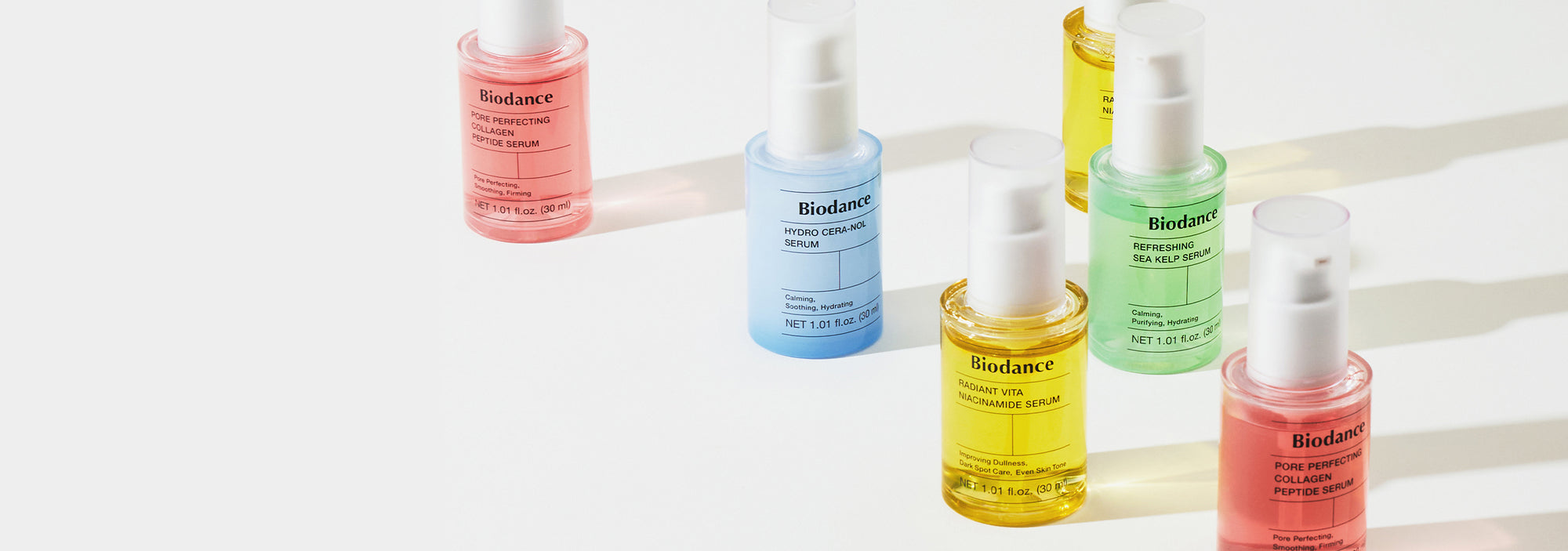 Set of Biodance skincare bottles on a white background
